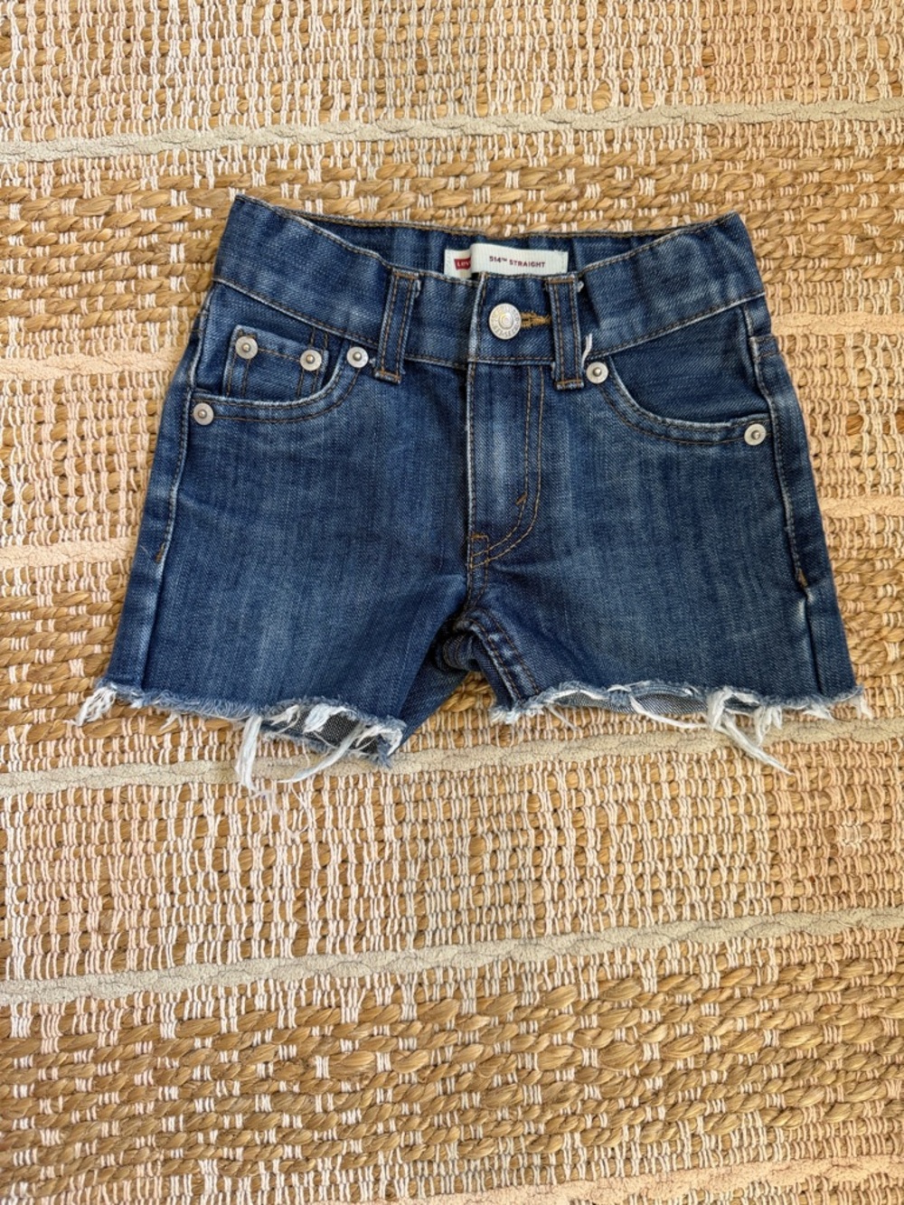 Levi’s Denim Cutoff Shorts in Dark Wash
